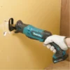 Scie Sabre 10.8 V Li-ion 4 Ah CXT MAKITA - JR103DSMJ 2 Scie Sabre 10.8 V Li-ion 4 Ah CXT MAKITA - JR103DSMJ -Outillage Soldes SDD40017 1
